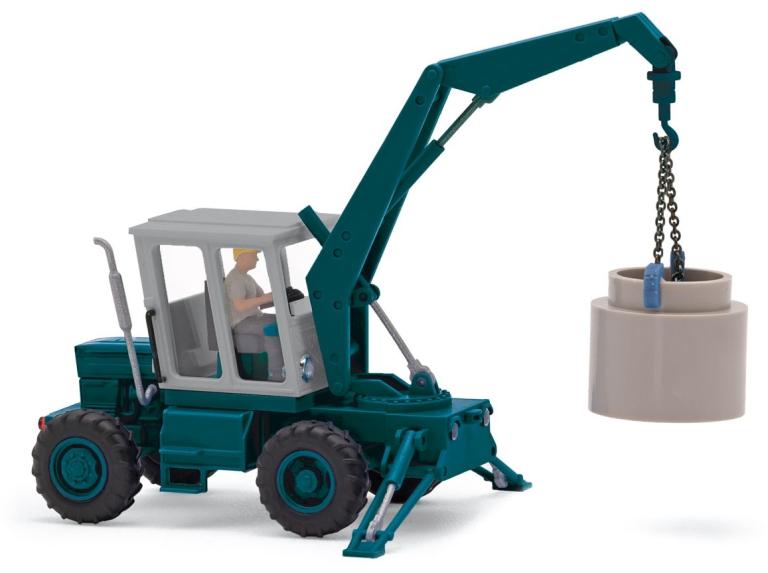 Mobilbagger TIH 445 mit Fahrer und Betonrohr